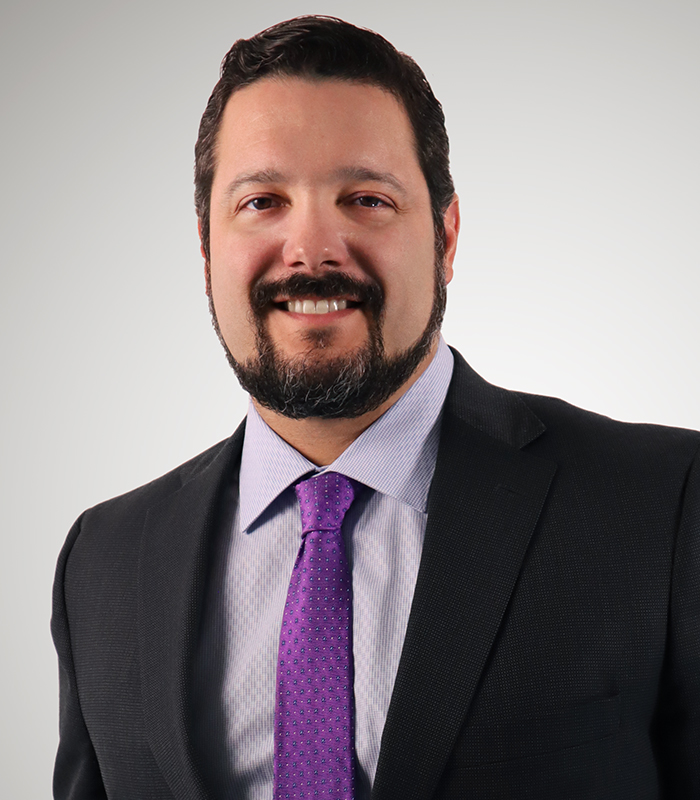 RA_OI_CorporateHeadshots_COsorio_0713_02 Image of Carlos Osorio
